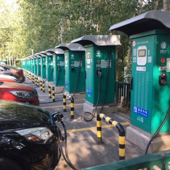 Electric vehicles power up at fast-charging stations in Beijing, China. Photo: Merran Smith.